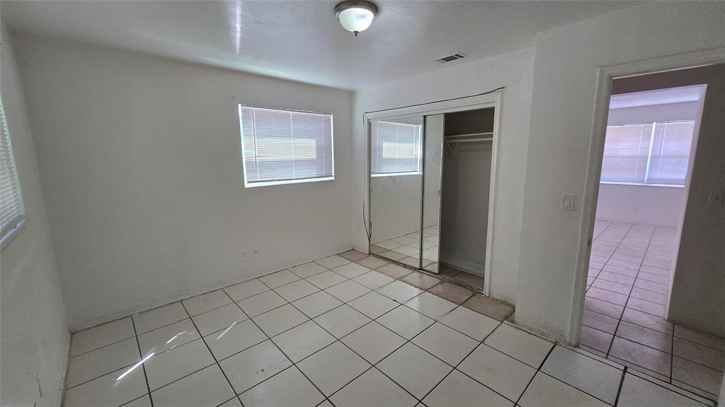 2501 Pierce Street, Unit 6 Hollywood, FL 33020 - Photo 4 of 5 a view of an empty room and window