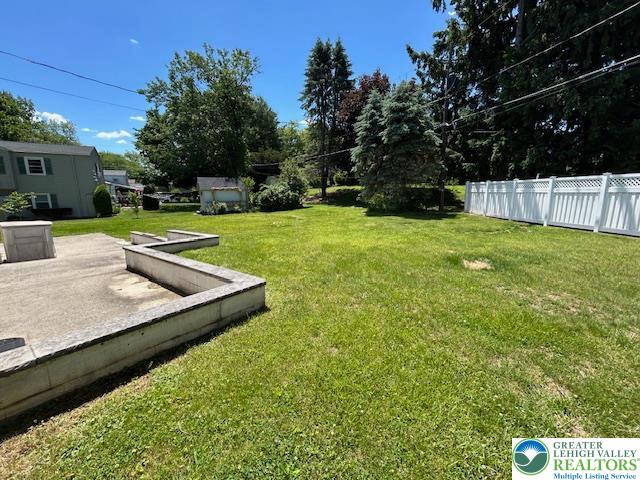 2065 Hopewell Road Bethlehem, PA 18017 - Photo 17 of 19 A spacious grassy yard offers ample room for outdoor activities.