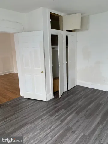 a view of a livingroom with wooden floor