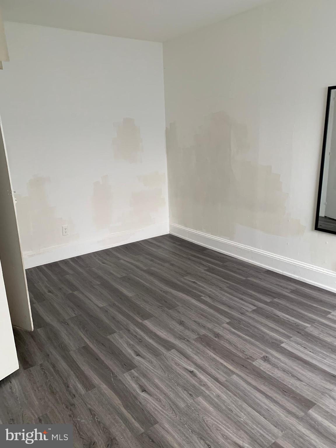 65-69 High Street, Unit 5 Mount Holly, NJ 08060 - Photo 6 of 10 wooden floor in a empty room