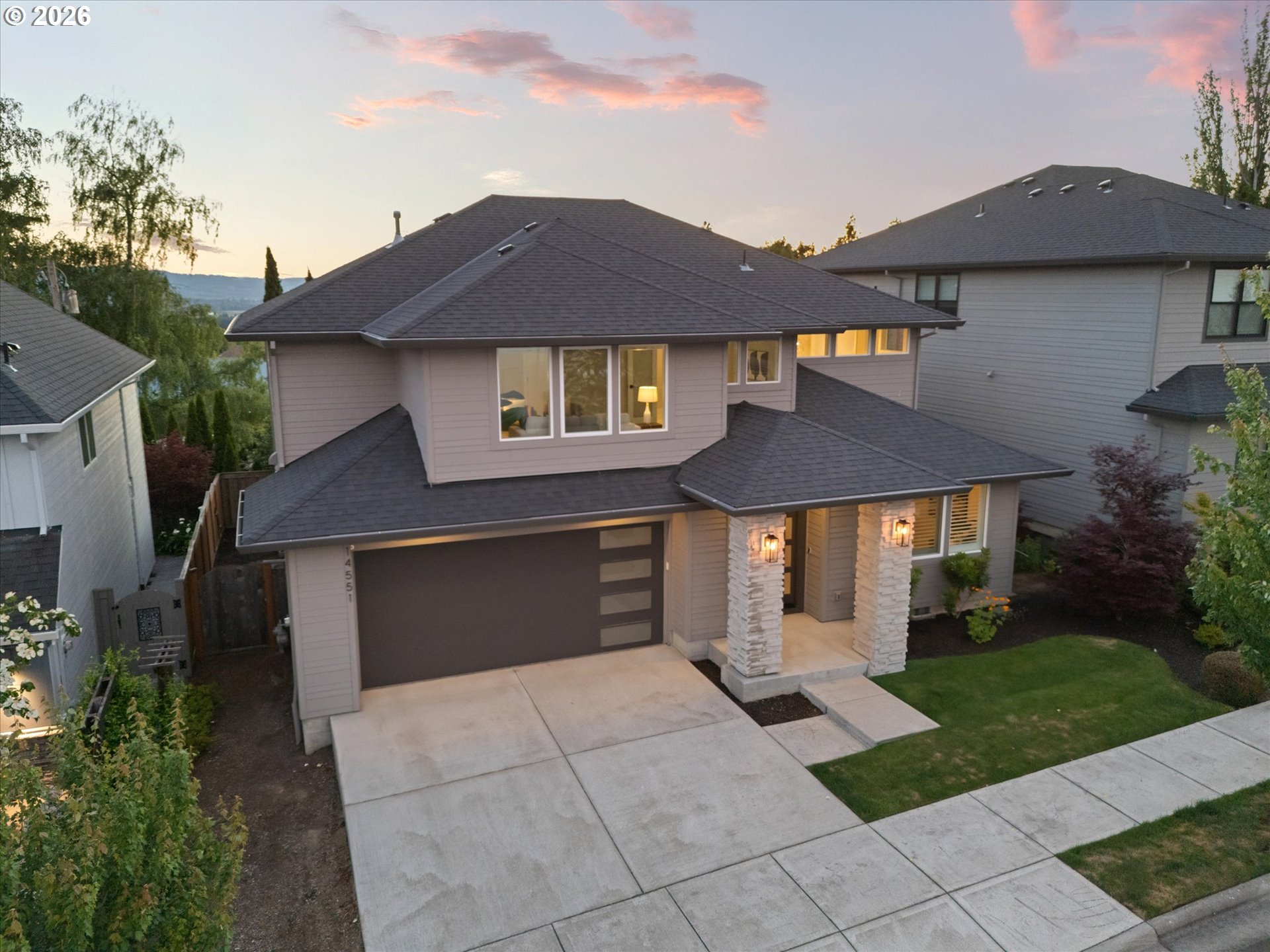 14551 Southwest 153rd Avenue Portland, OR 97224 - Photo 42 of 45 a front view of a house with a yard
