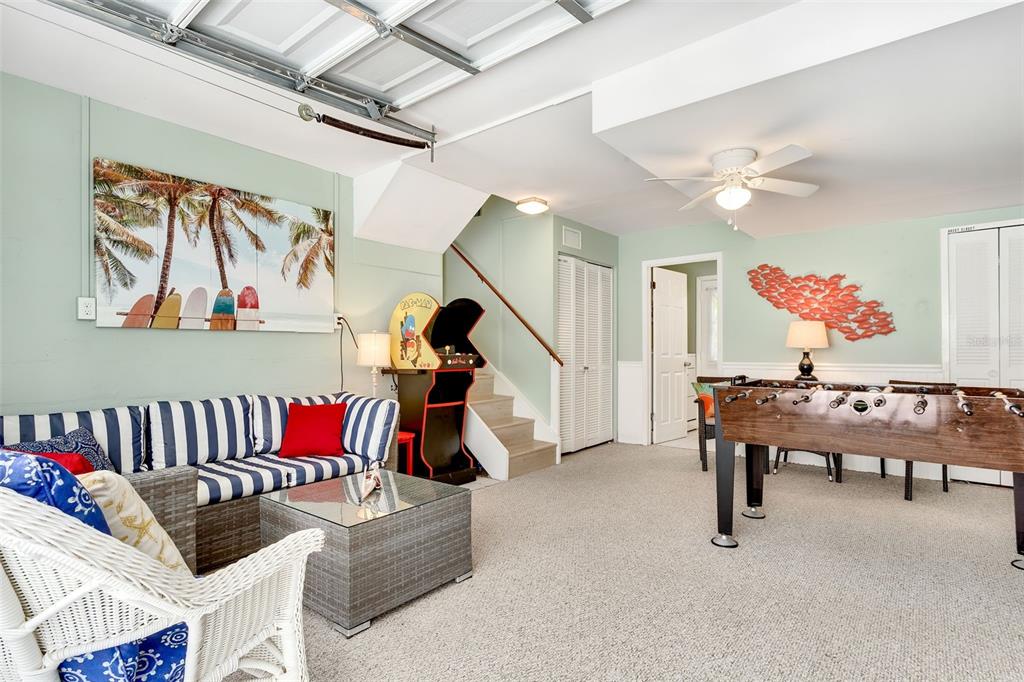 412 80th Street Holmes Beach, FL 34217 - Photo 37 of 58 a living room with furniture and a couch