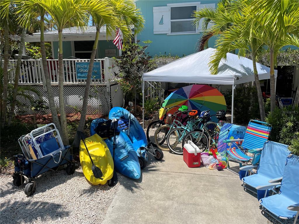 412 80th Street Holmes Beach, FL 34217 - Photo 46 of 58 a view of a chairs and tables in patio