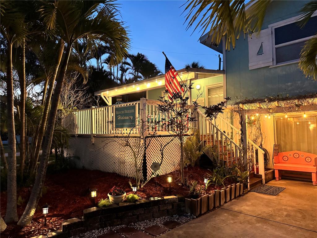 412 80th Street Holmes Beach, FL 34217 - Photo 47 of 58 a view of a house with a street