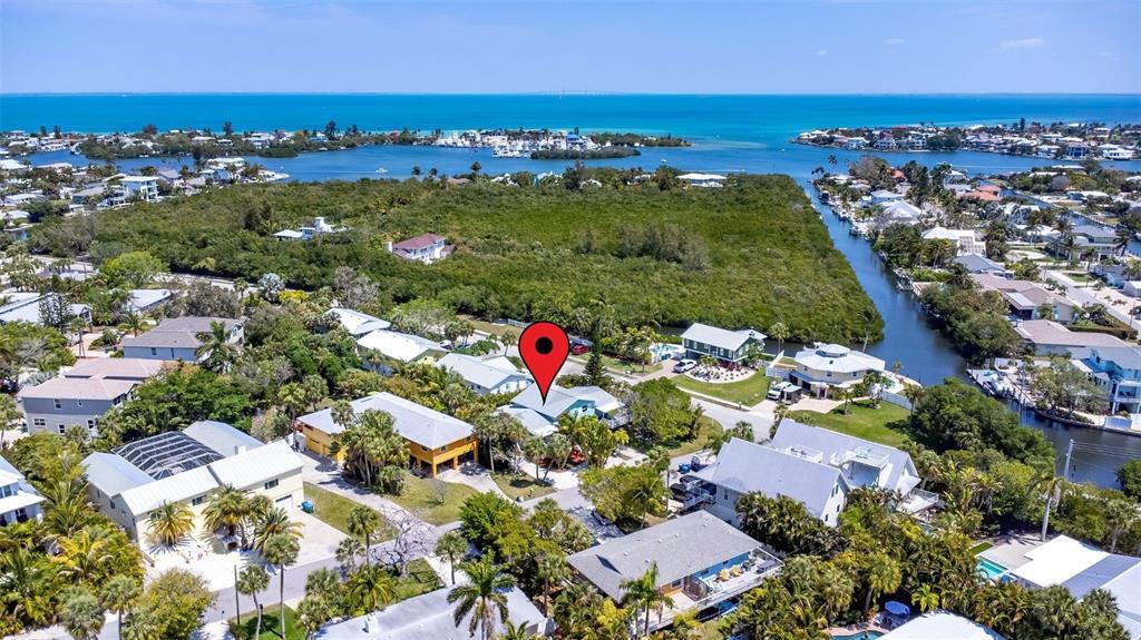 412 80th Street Holmes Beach, FL 34217 - Photo 54 of 58 an aerial view of residential houses with outdoor space
