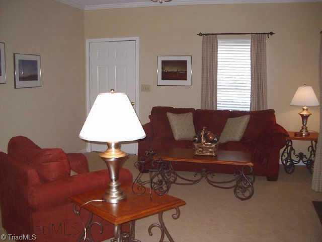 3716 Cranbrook Point High Point, NC 27265 - Photo 3 of 9 Other. The spacious living room features a neutral decor, and a fireplace too!