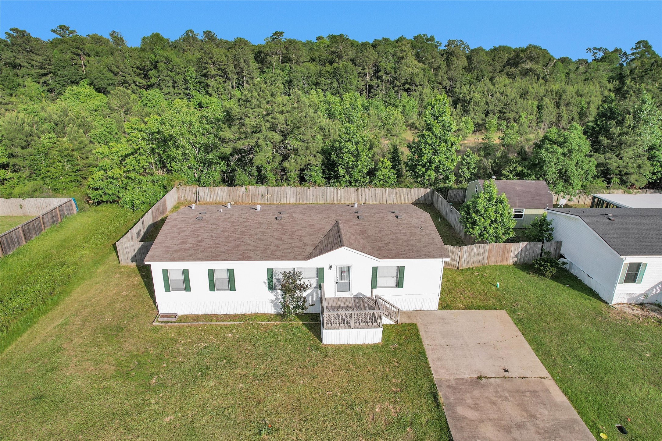 16426 Trenda Court Conroe, TX 77306 - Photo 34 of 35 an aerial view of a house with big yard