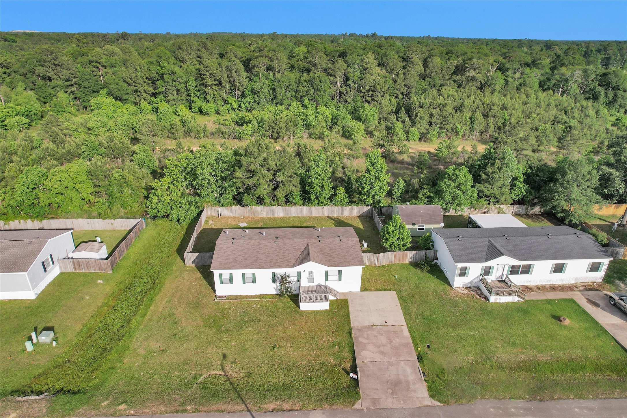 16426 Trenda Court Conroe, TX 77306 - Photo 35 of 35 an aerial view of a house with big yard