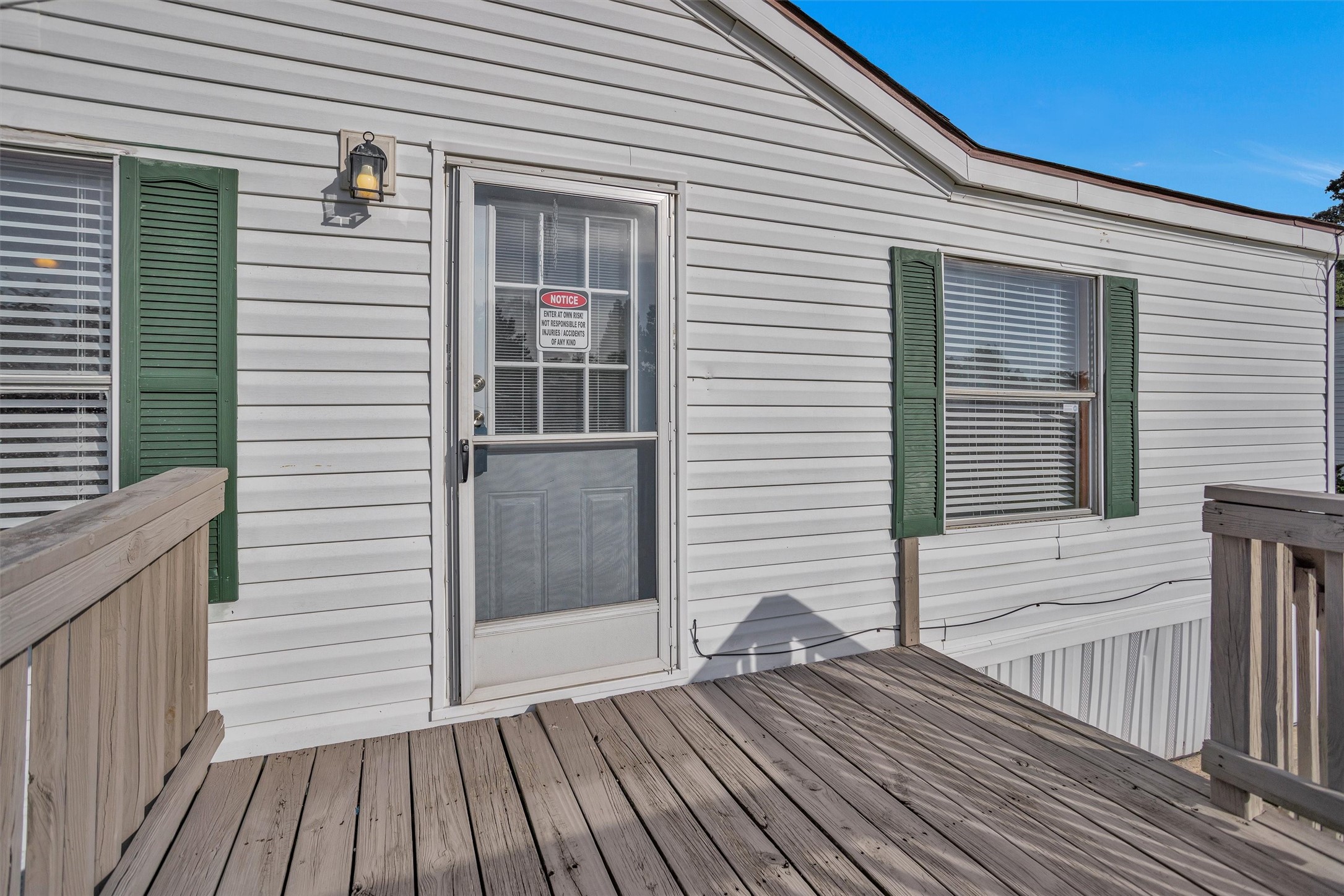 16426 Trenda Court Conroe, TX 77306 - Photo 5 of 35 a view of a house with wooden deck