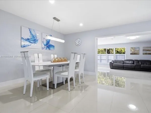a view of a dining room with furniture