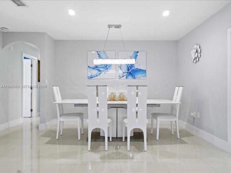 3345 Southwest 109th Court Miami, FL 33165 - Photo 15 of 41 a view of a dining room with furniture