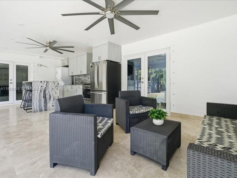 3345 Southwest 109th Court Miami, FL 33165 - Photo 38 of 41 a living room with furniture and a large window