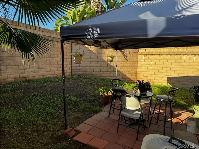 a view of a park with houses