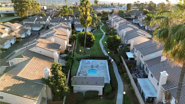 a view of a lake with houses in the background