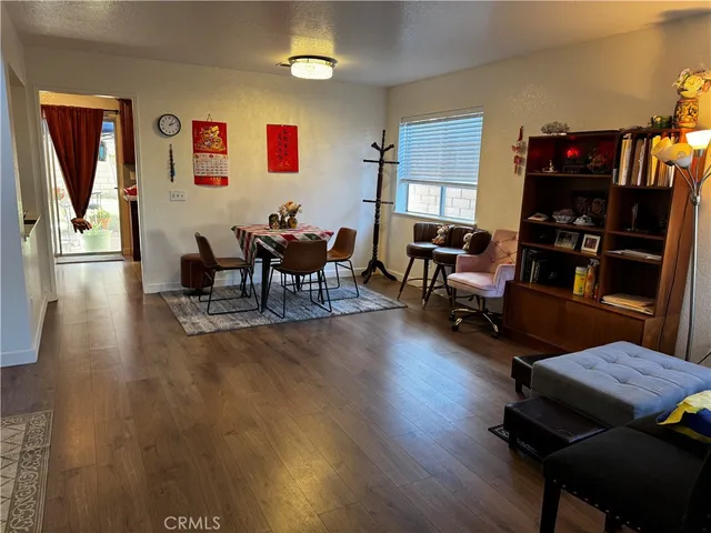 a kitchen with stainless steel appliances granite countertop wooden cabinets a stove top oven a sink and dishwasher