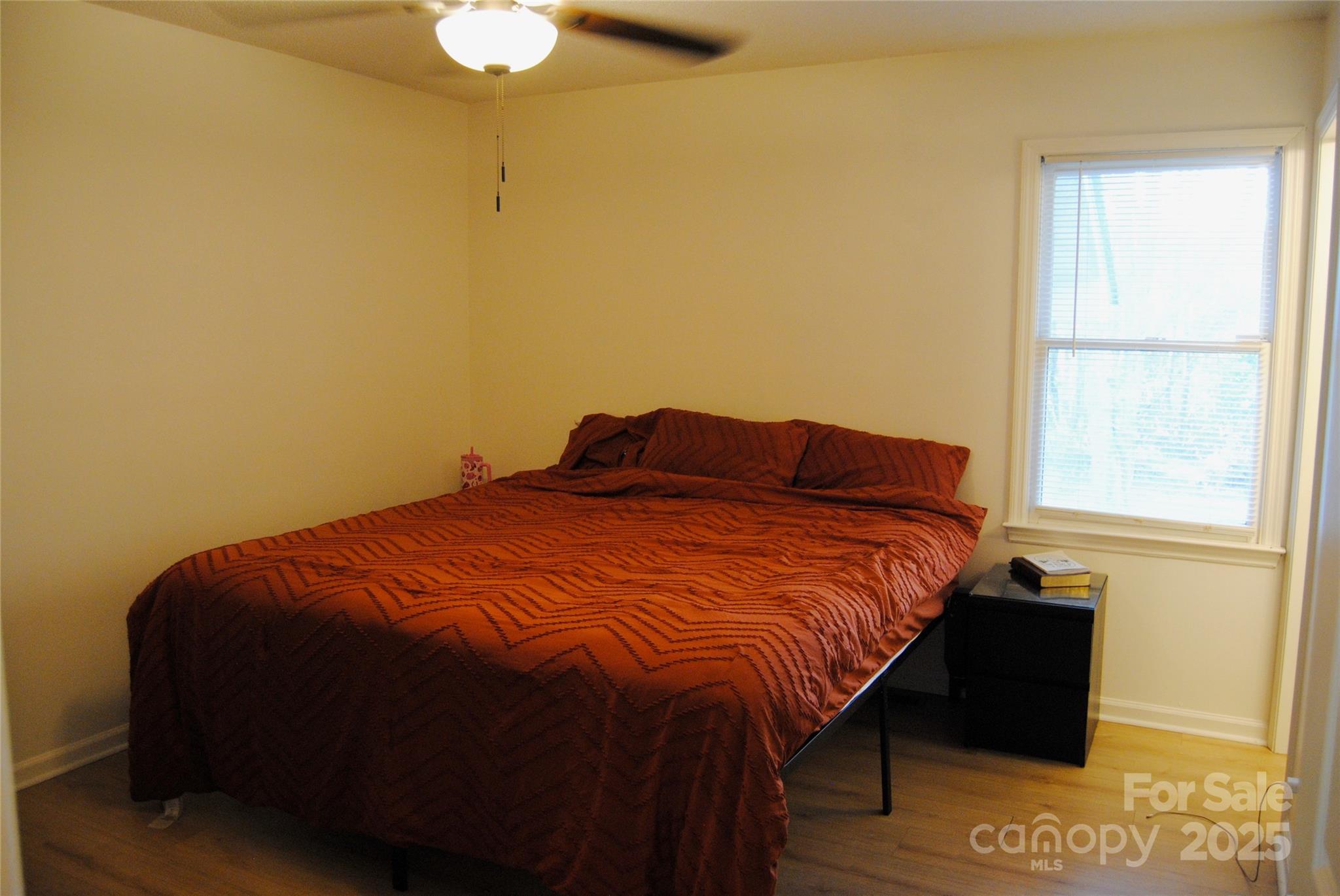 2191 Pacer Road Lancaster, SC 29720 - Photo 11 of 15 a bed sitting in a bedroom next to a window