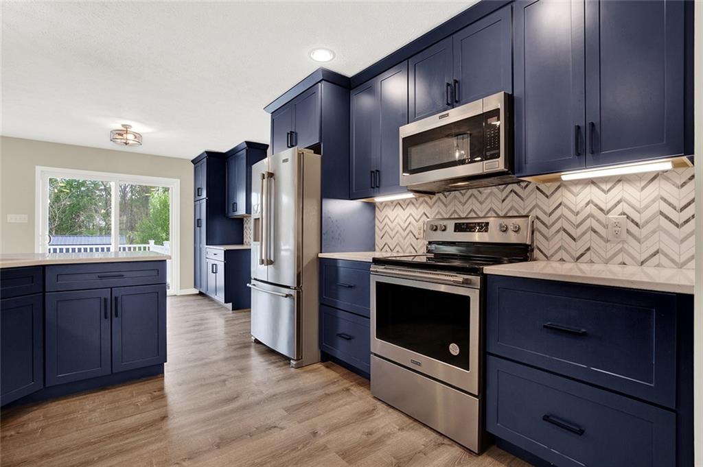 667 Old Frame Road Smithfield, PA 15478 - Photo 21 of 38 Custom cabinetry and modern appliances