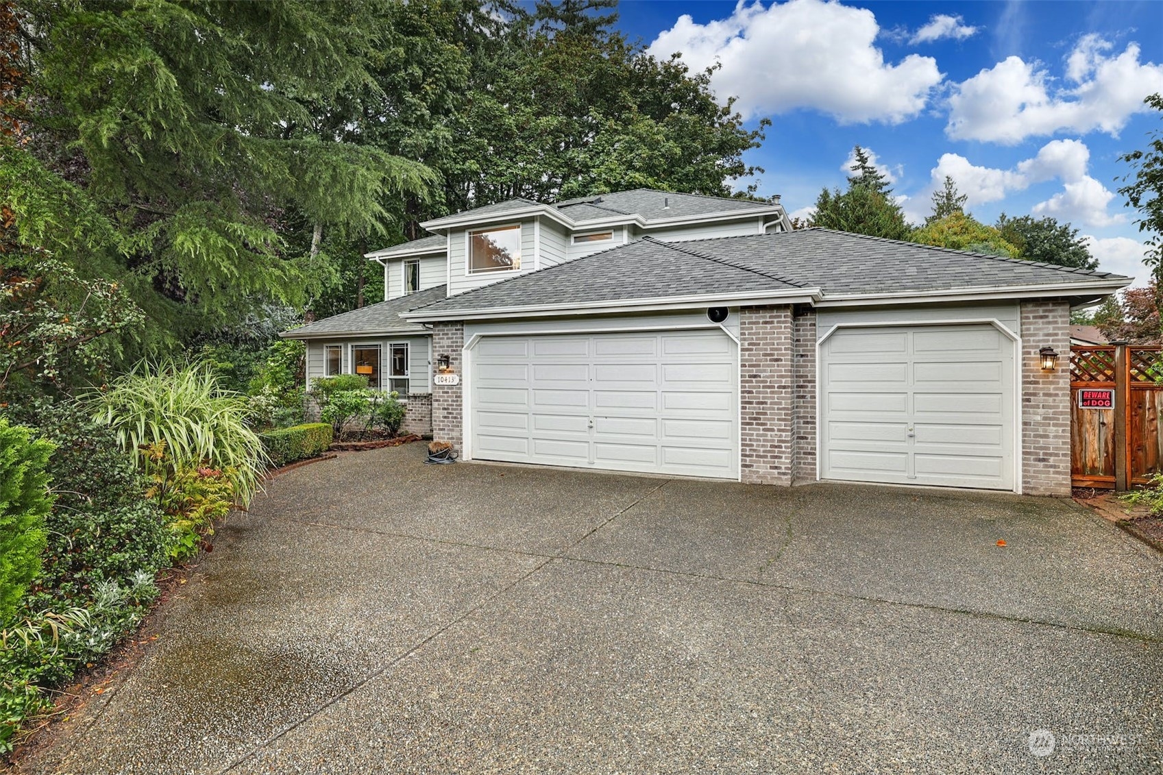 10413 Southeast 186th Place Renton, WA 98055 - Photo 1 of 34 front view of house with a yard