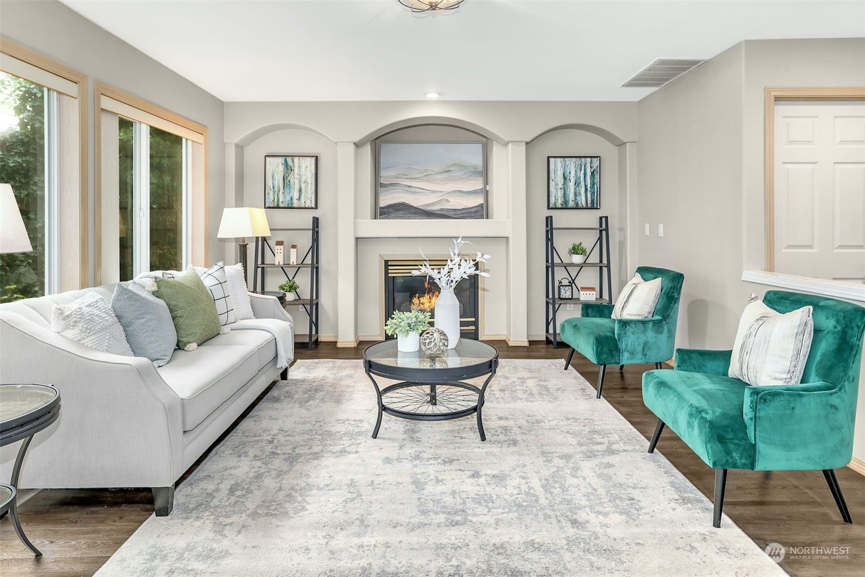 10413 Southeast 186th Place Renton, WA 98055 - Photo 16 of 34 a living room with fireplace furniture and a large window