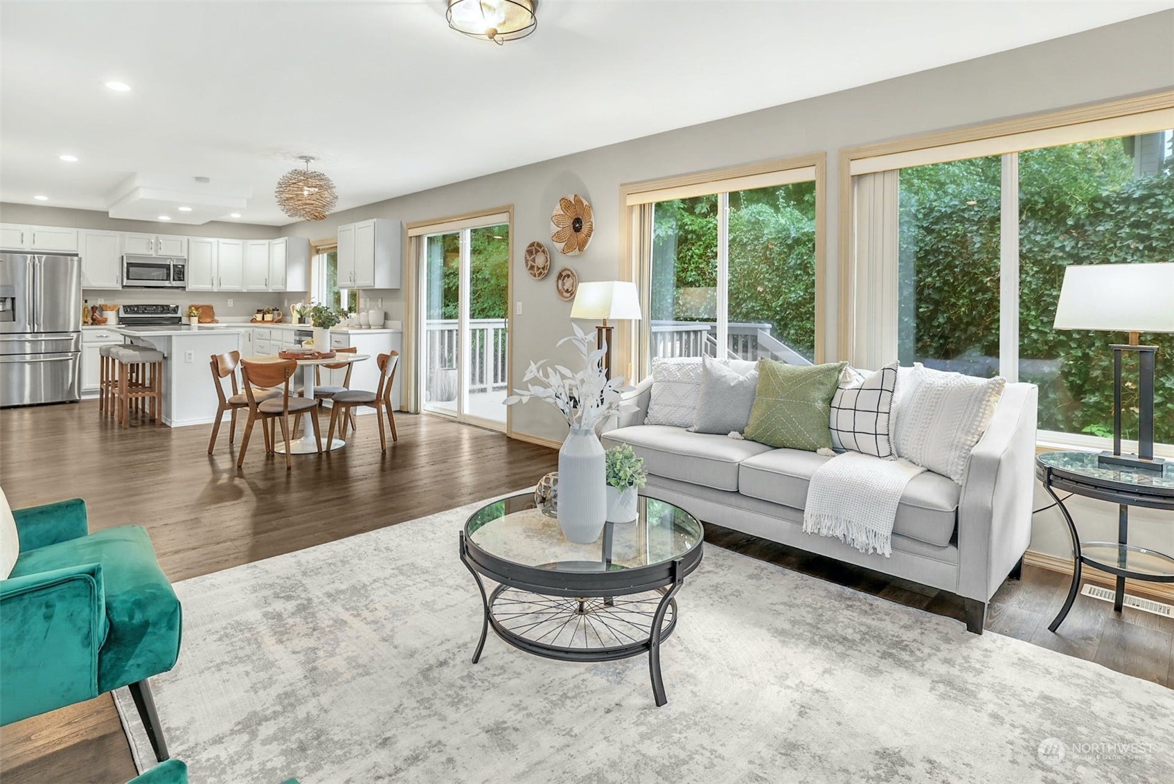 10413 Southeast 186th Place Renton, WA 98055 - Photo 17 of 34 a living room with furniture and a large window