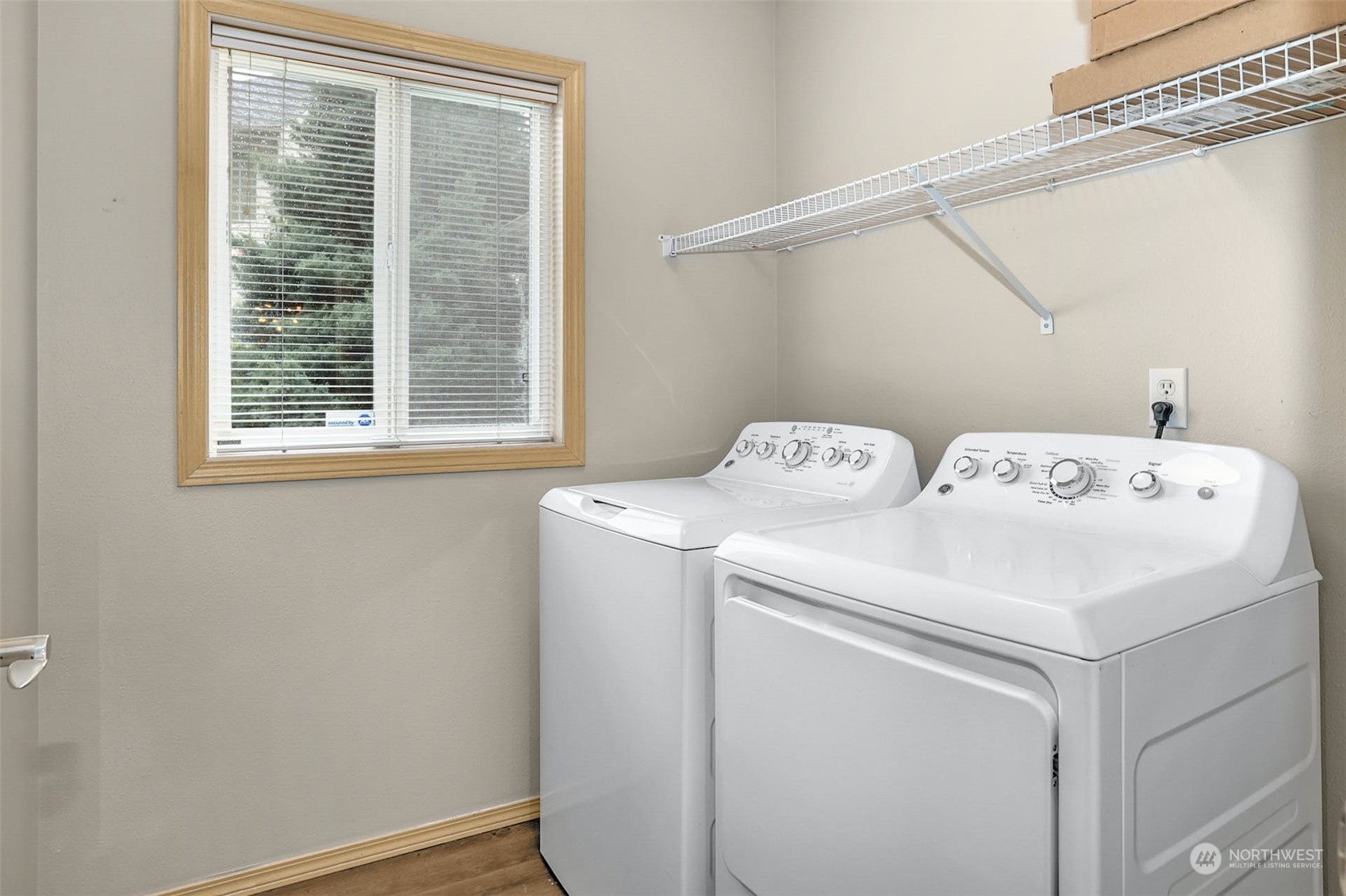 10413 Southeast 186th Place Renton, WA 98055 - Photo 18 of 34 a utility room with dryer and washer