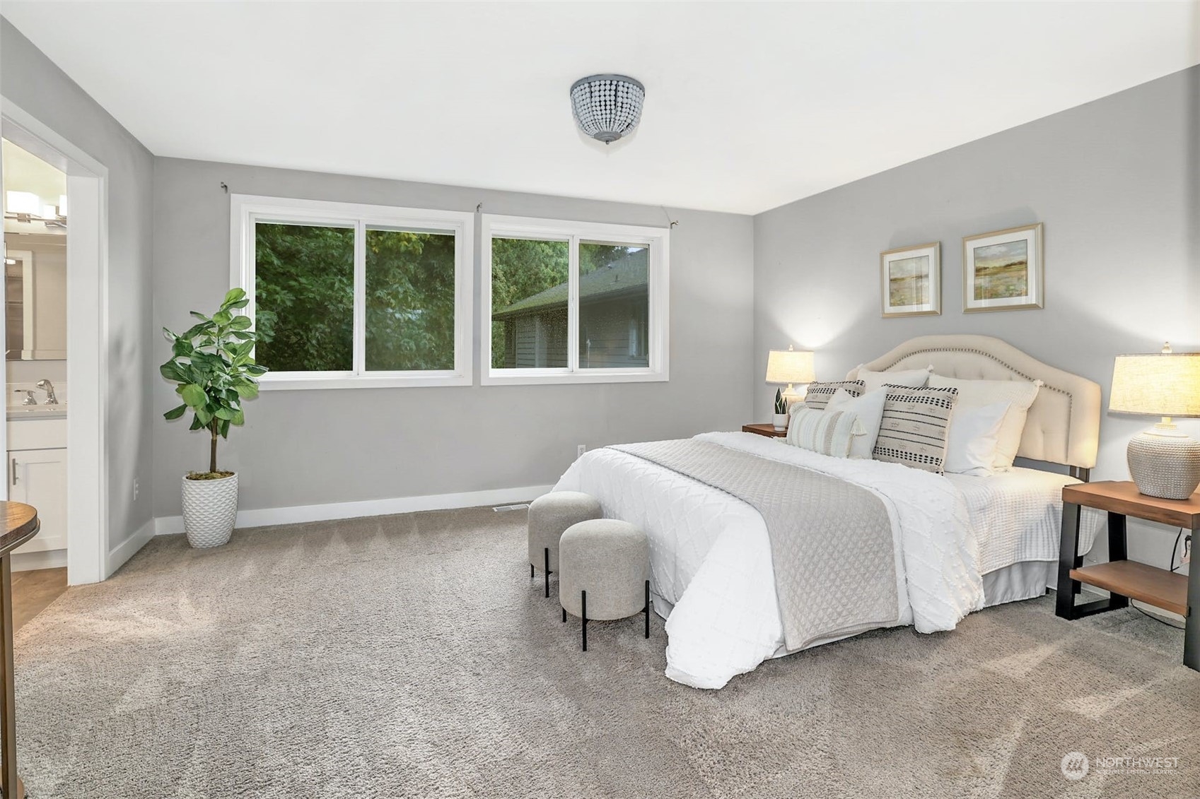 10413 Southeast 186th Place Renton, WA 98055 - Photo 20 of 34 a bedroom with a bed and a window