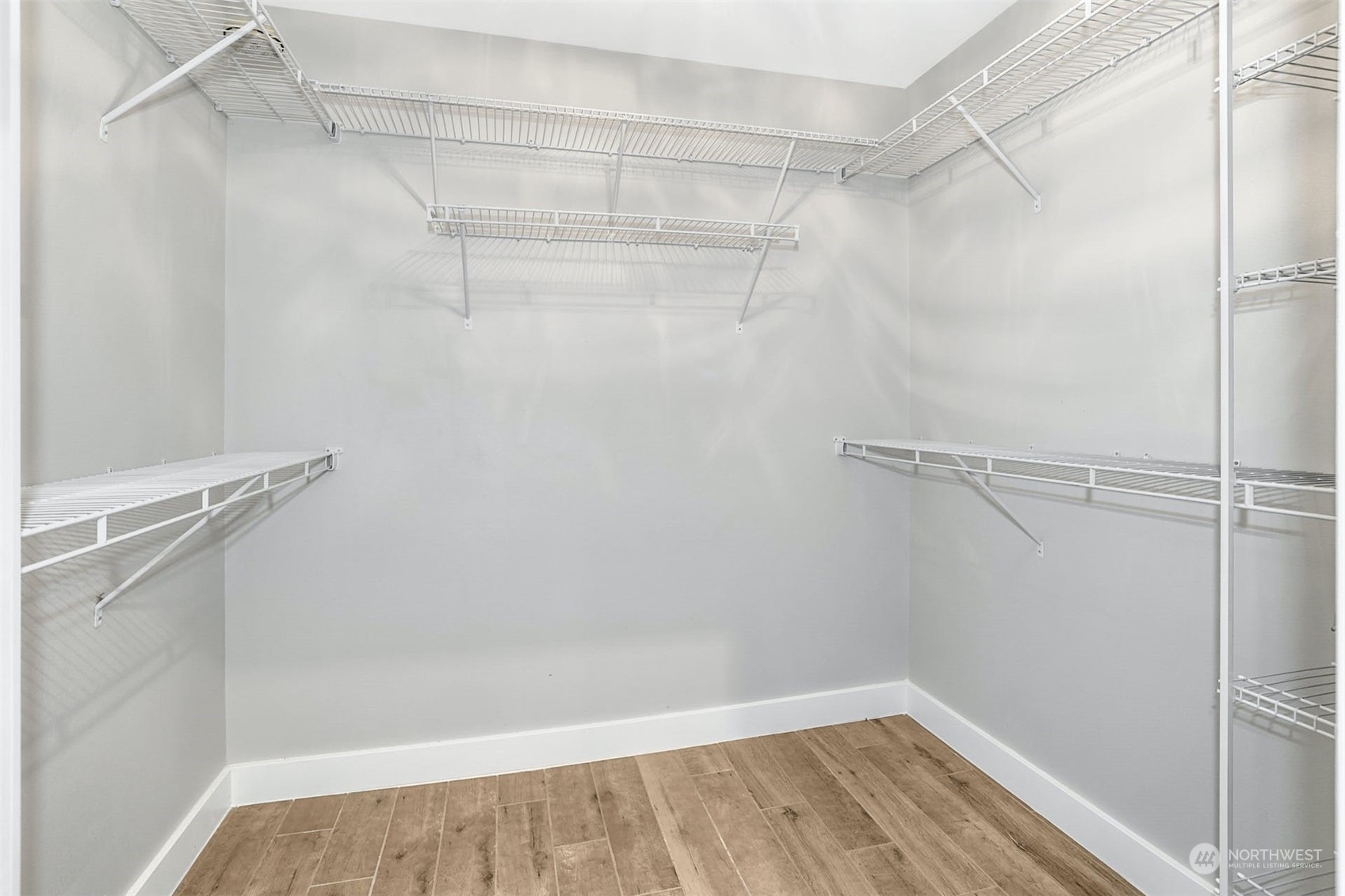 10413 Southeast 186th Place Renton, WA 98055 - Photo 24 of 34 a view of a room with racks on the wall