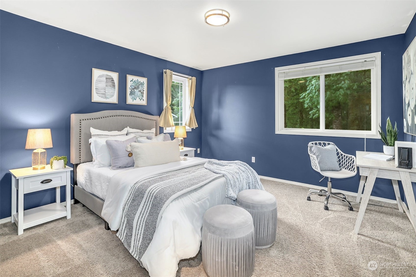 10413 Southeast 186th Place Renton, WA 98055 - Photo 25 of 34 a bed room with a bed and a chair