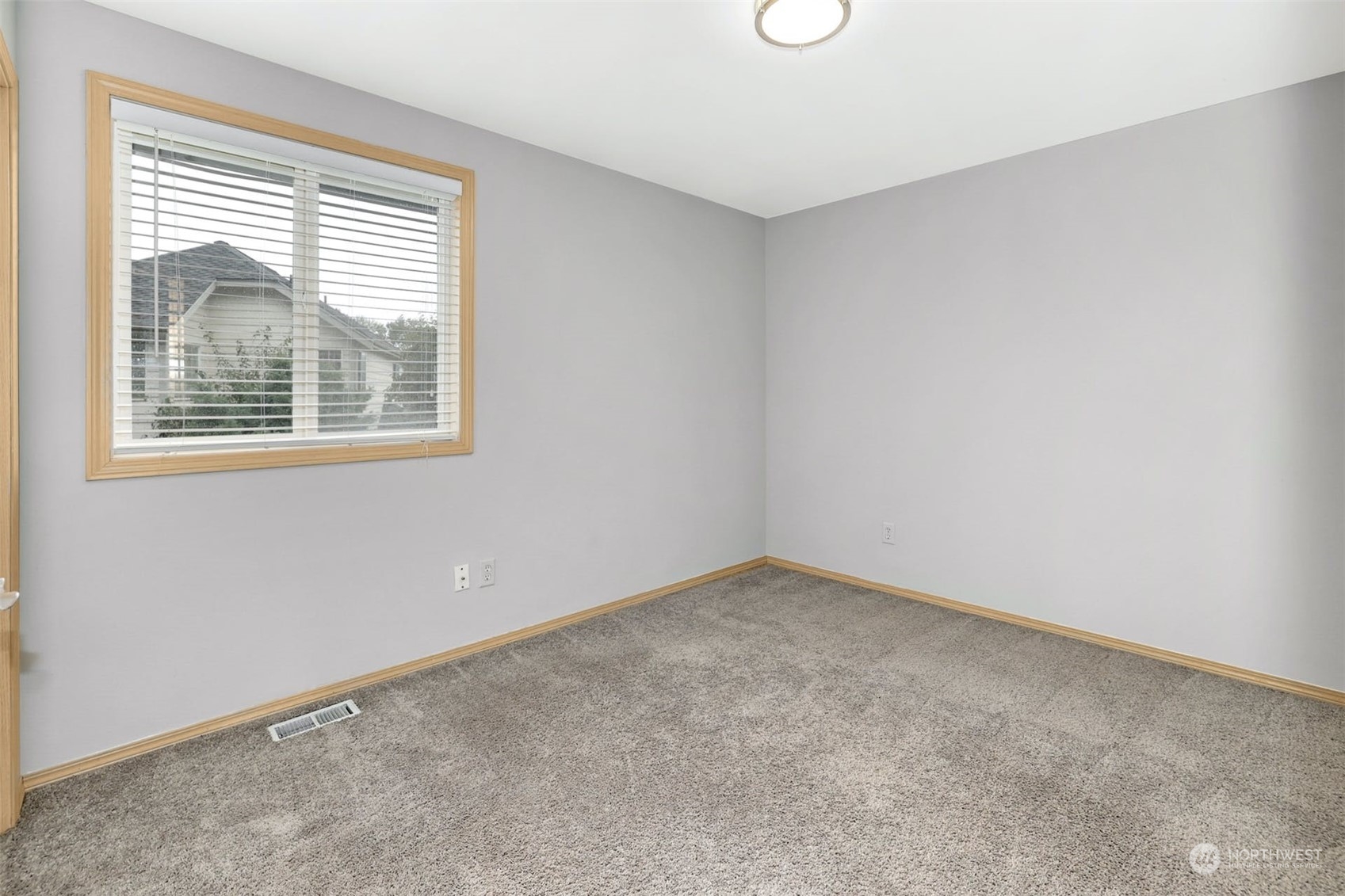 10413 Southeast 186th Place Renton, WA 98055 - Photo 26 of 34 an empty room with a window
