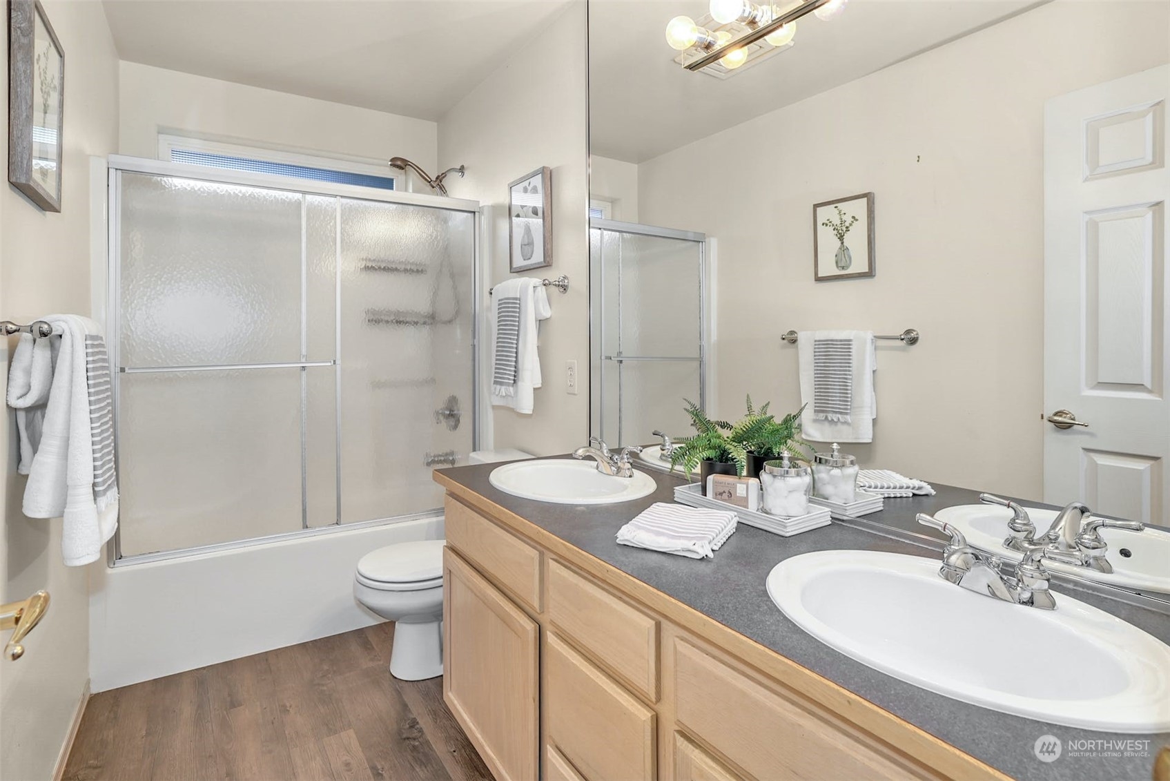 10413 Southeast 186th Place Renton, WA 98055 - Photo 28 of 34 a bathroom with a granite countertop sink toilet and shower