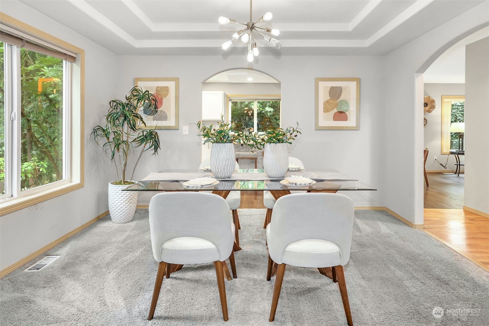 10413 Southeast 186th Place Renton, WA 98055 - Photo 8 of 34 a view of a dining room with furniture window and wooden floor