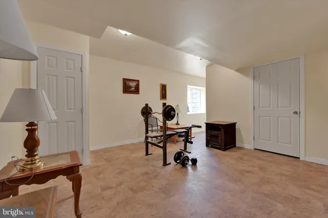 a view of a workspace with furniture