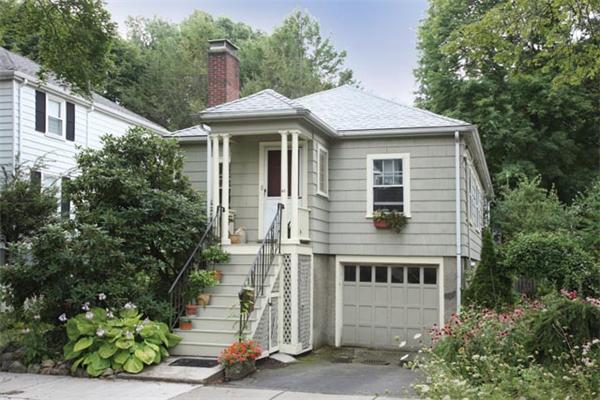 45 Margaret Road Newton, MA 02461 - Photo 1 of 6 a front view of a house with a yard