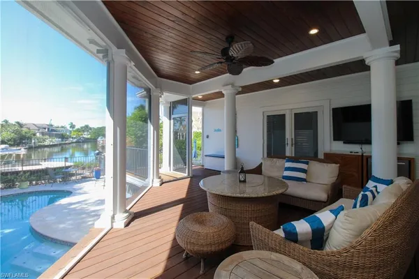 a outdoor space with patio furniture and garden view