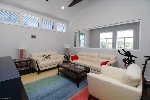 a living room with furniture and a couch