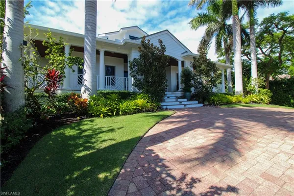 a view of a house with a garden
