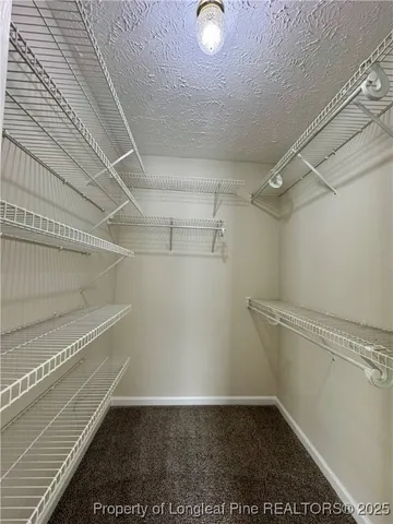 a view of a room with racks on the wall