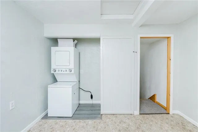 a white toilet sitting next to a bathroom sink