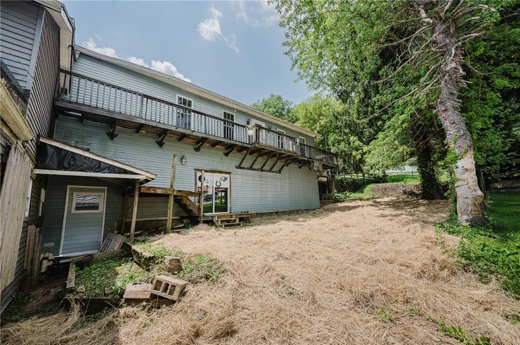 150 Penn Street Clymer, PA 15728 - Photo 32 of 38 a house with trees in front of it