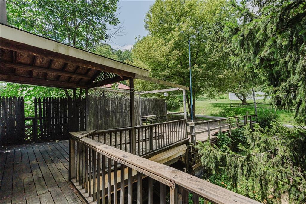 150 Penn Street Clymer, PA 15728 - Photo 34 of 38 a view of a wooden deck with a backyard