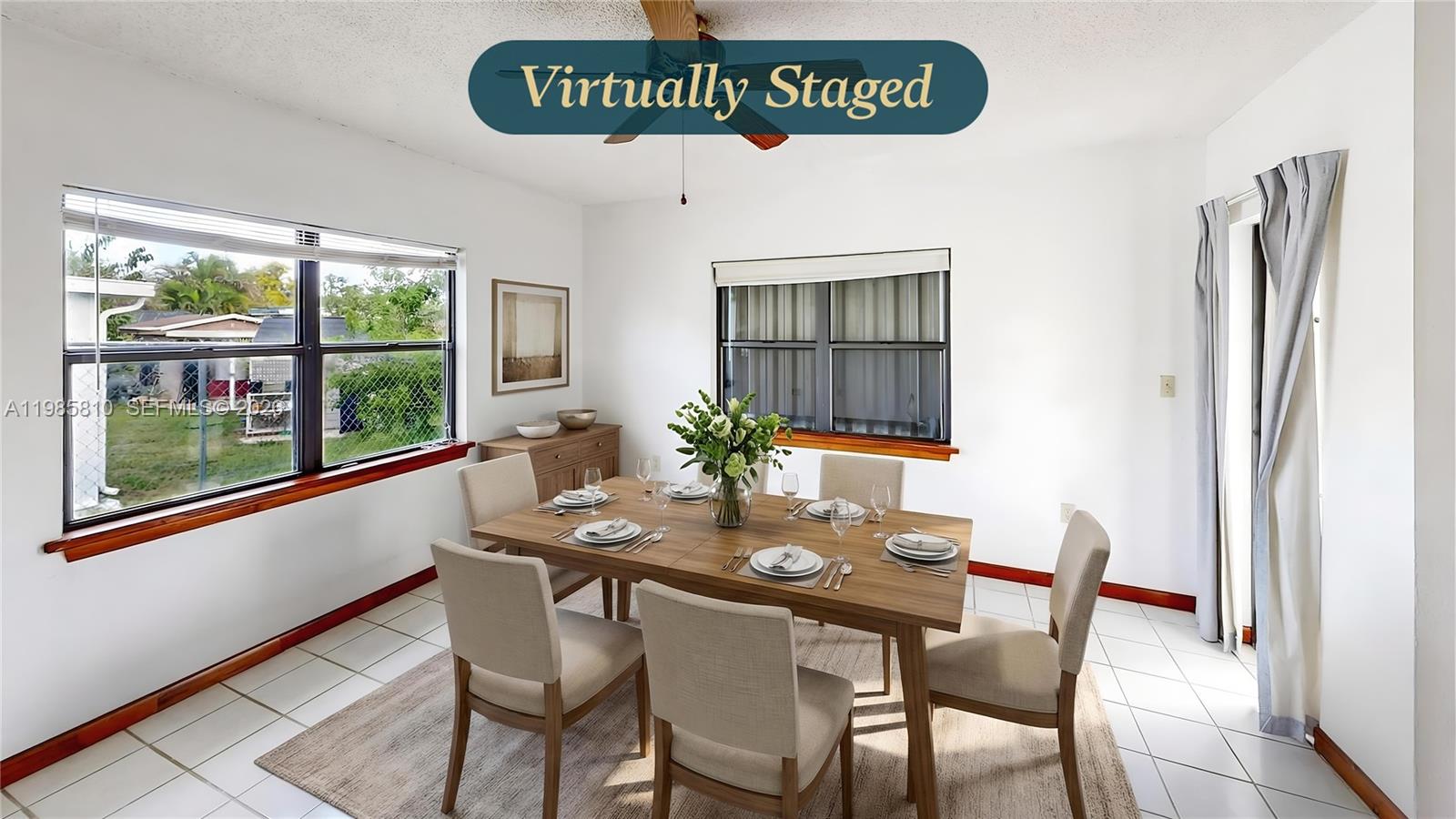 14380 Southwest 297th Street Homestead, FL 33033 - Photo 22 of 62 a view of a dining room with furniture window and outside view