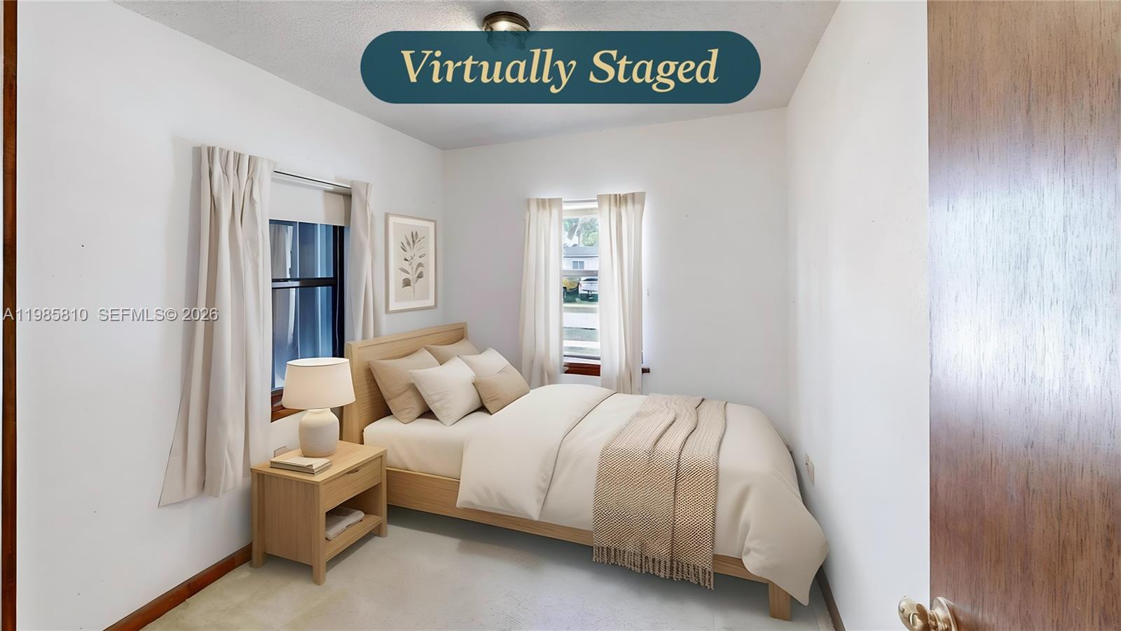 14380 Southwest 297th Street Homestead, FL 33033 - Photo 30 of 62 a bedroom with a bed and a window