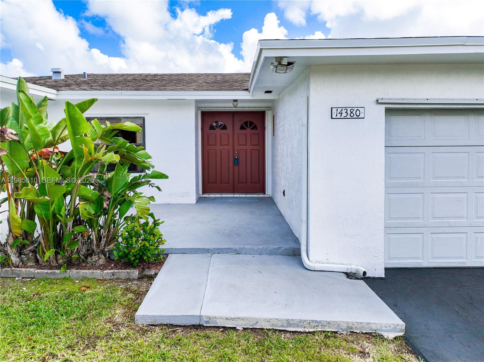 14380 Southwest 297th Street Homestead, FL 33033 - Photo 3 of 62 a view of a back yard of the house