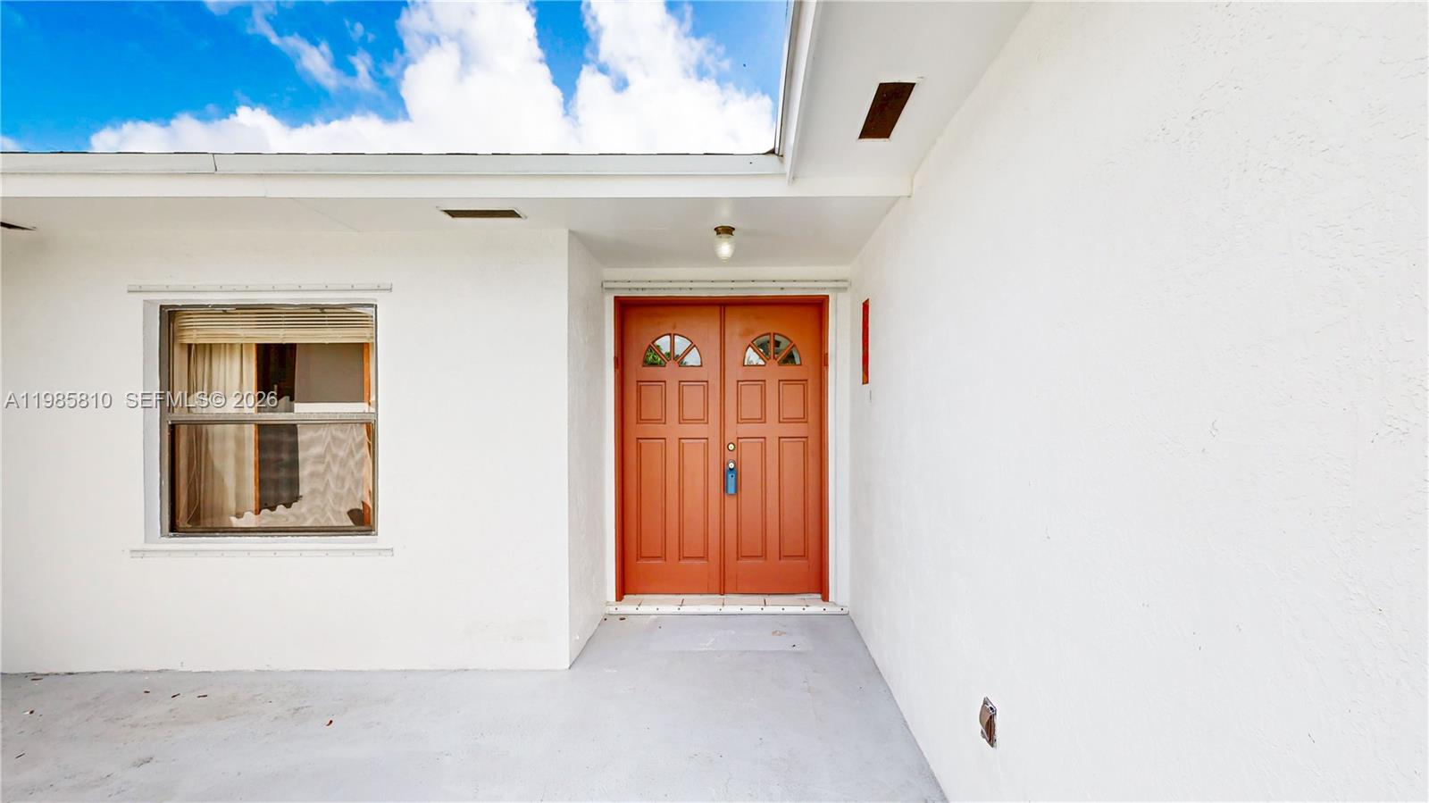 14380 Southwest 297th Street Homestead, FL 33033 - Photo 4 of 62 a view of an entryway
