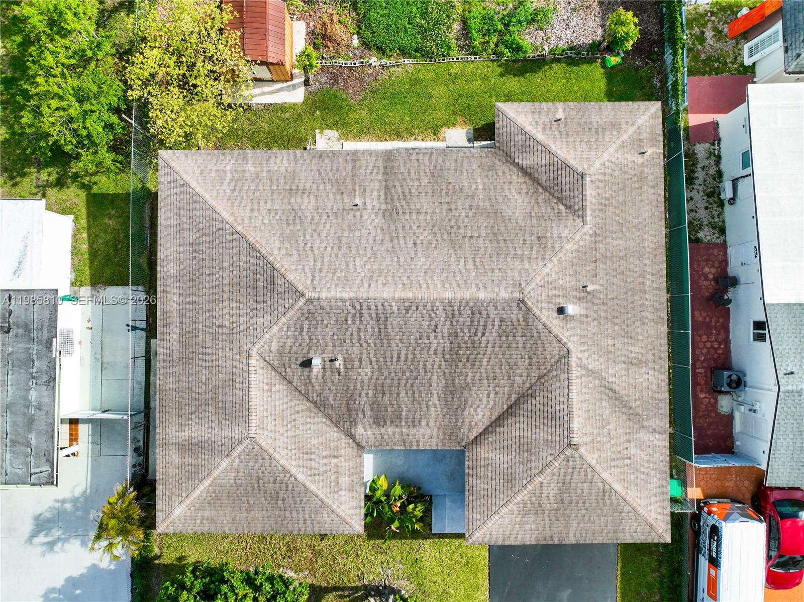 14380 Southwest 297th Street Homestead, FL 33033 - Photo 53 of 62 a aerial view of a house with a garden and plants