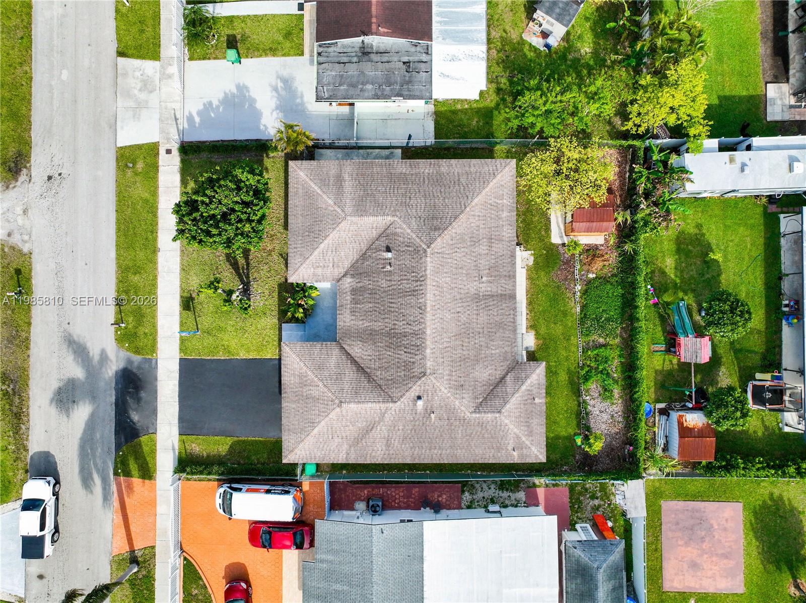 14380 Southwest 297th Street Homestead, FL 33033 - Photo 54 of 62 an aerial view of residential houses with outdoor space