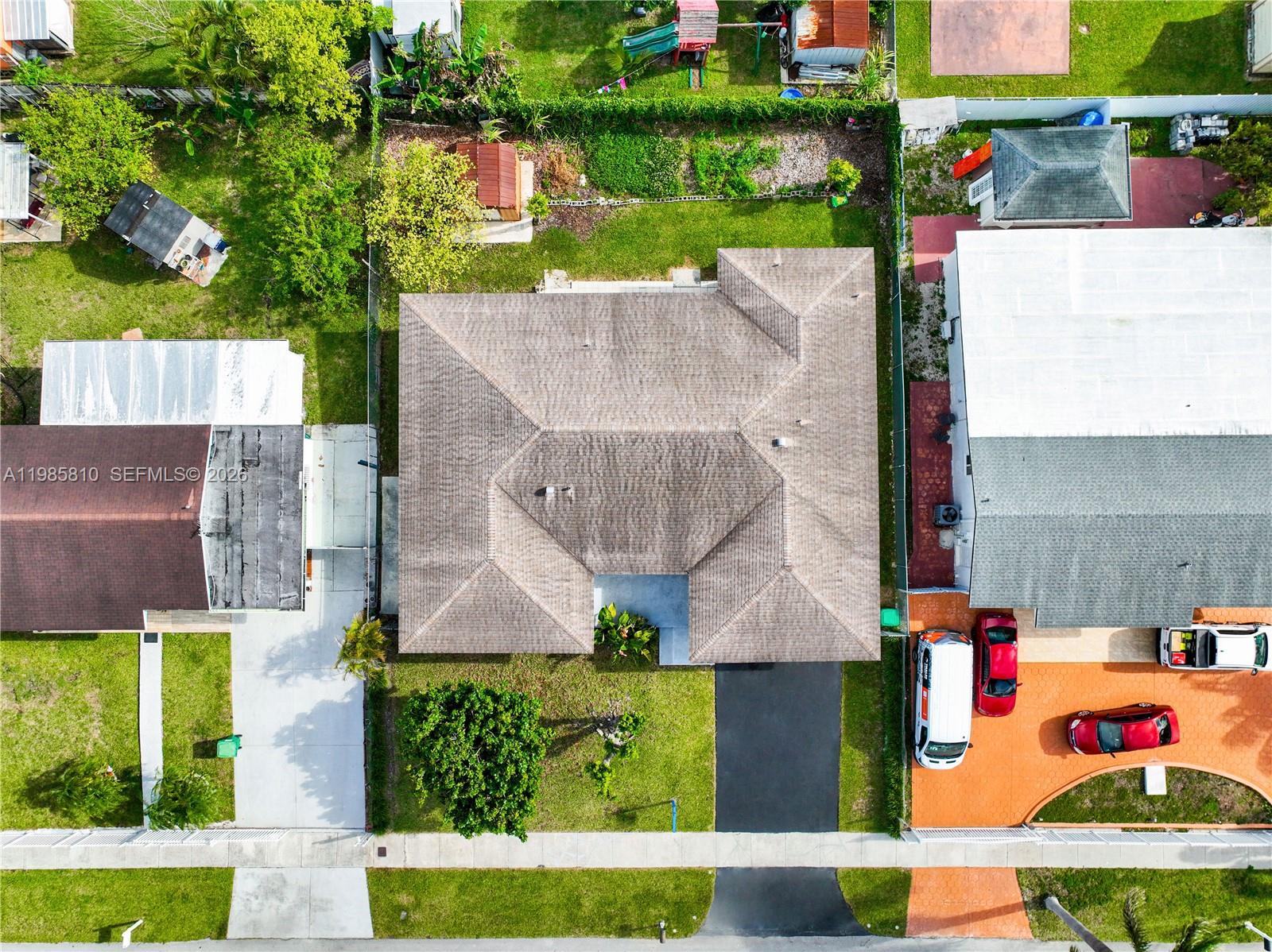 14380 Southwest 297th Street Homestead, FL 33033 - Photo 55 of 62 an aerial view of houses with yard