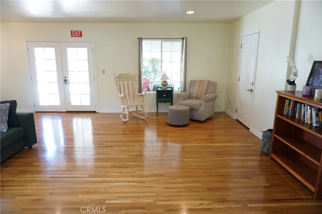 a view of a dining room with furniture and a table