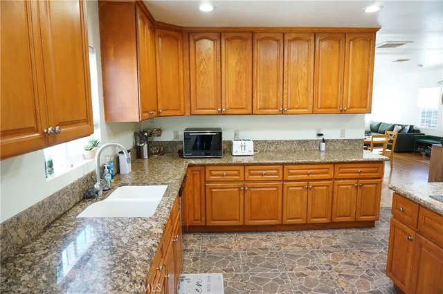 a bedroom with a bed and a fireplace