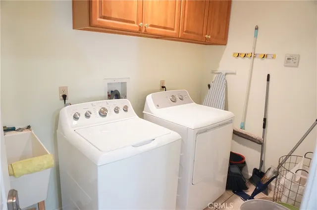 a bathroom with a sink a mirror and a shower